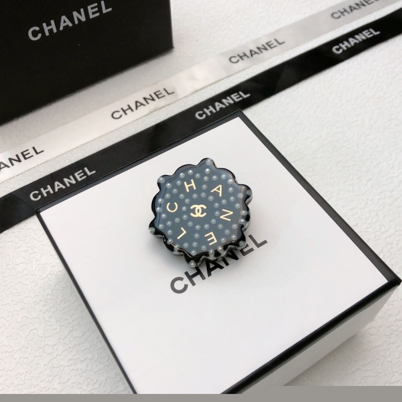 Ch*el brooches